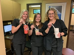 Marquette employees drinking cofee